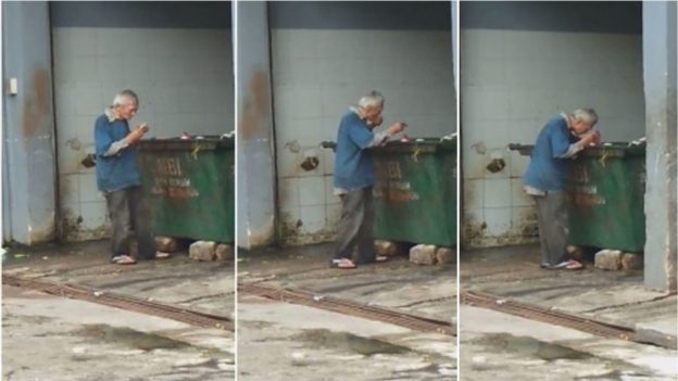 Lelaki warga emas sedang kelaparan selongkar sampah di tempat pembuangan, terus suap apabila menjumpai cebisan makanan